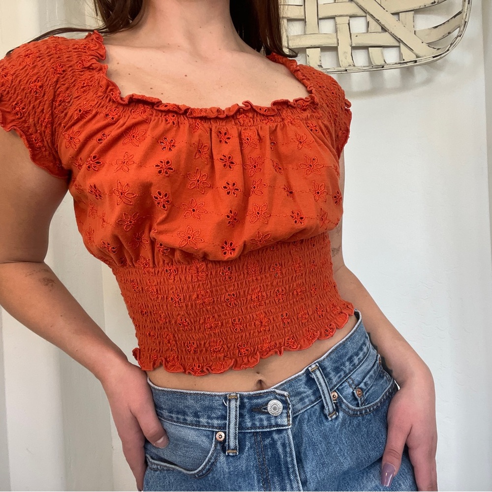 orange floral crop